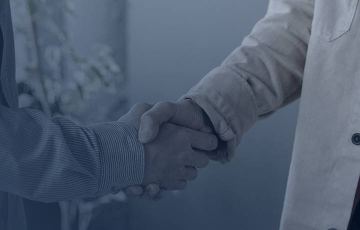 Attorney and client shaking hands
